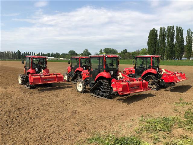 A group of coordinating, self-driving tractors are being tested on the test field at the University of Hokkaido in Sapporo. (credits: STOffice Tokyo)
